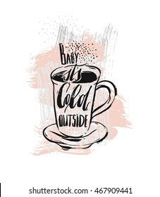 Baby its cold outside.Handwritten ink Lettering on hot drink cup shape coffee tea cocoa hot chocolate. Calligraphy style romantic winter quote on cup silhouette in pastel colors isolated on white