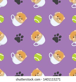 Baby cute pomeranian puppy in a tea cup with footprint symbol and football seamless pattern background