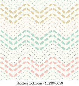 Baby dotted chevron seamless pattern in pastel colours. A pretty hand drawn geometric vector repeat design ideal for children and baby projects.