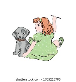 Baby draws on the wall sitting on the floor with puppy. Happy childhood. Red-haired girl in green dress with dog. 