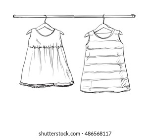 Baby dress sketch. Clothes on the hanger.