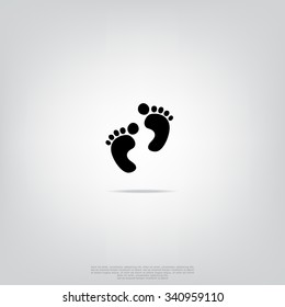 Baby feet icon in black