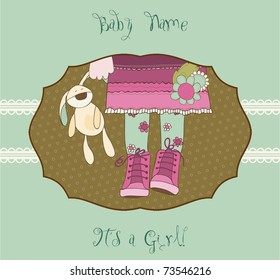 Baby girl arrival announcement card with plush rabbit
