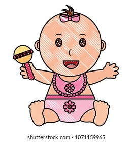 baby girl with diaper and jingle bell in hand