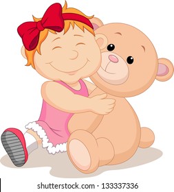 Baby girl hugging teddy bear stuff