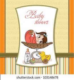 baby girl on on weighing scale