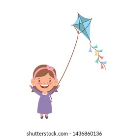 baby girl standing with kite in the hand