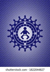 baby icon inside badge with denim texture. 