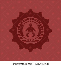 baby icon inside badge with red background
