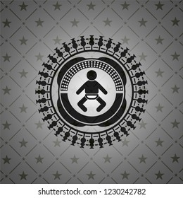 baby icon inside black badge