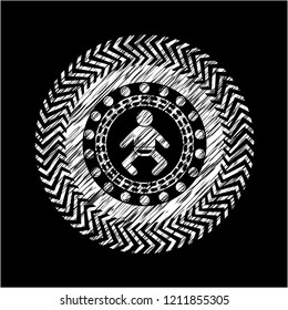 baby icon inside chalkboard emblem on black board