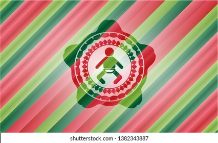 baby icon inside christmas colors style emblem.