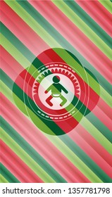 baby icon inside christmas style badge..