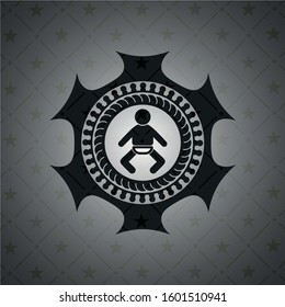 baby icon inside dark badge or emblem