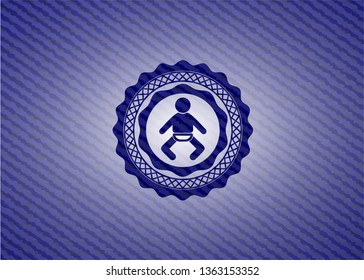 baby icon inside denim background
