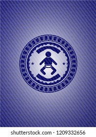 baby icon inside emblem with jean background