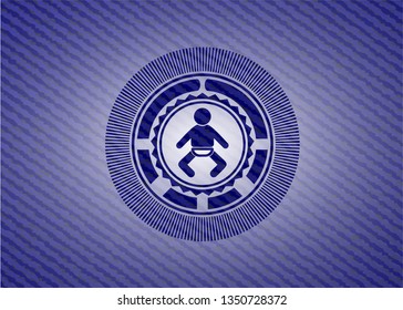 baby icon inside emblem with jean background