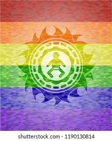 baby icon inside emblem on mosaic background with the colors of the LGBT flag