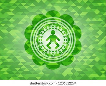 baby icon inside green emblem with mosaic background