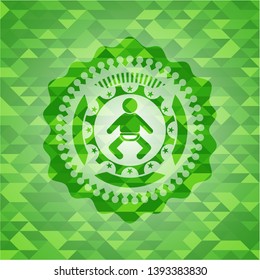 baby icon inside green mosaic emblem