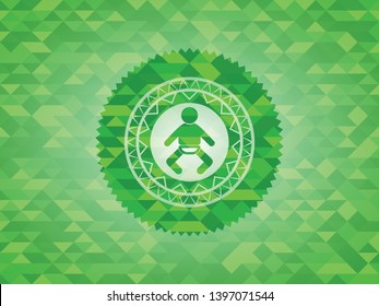 baby icon inside green mosaic emblem