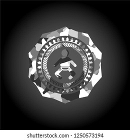 baby icon inside grey camo emblem
