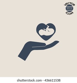 baby inside heart 