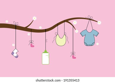 Baby Items Hanging from Tree