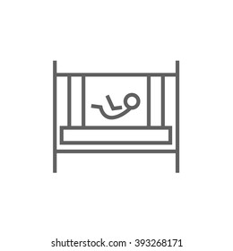 Baby laying in crib line icon.