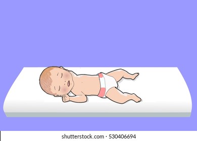 baby laying on changing table