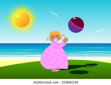 baby on a beach with a ball