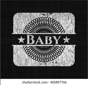 Baby on blackboard