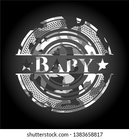 Baby on grey camouflaged pattern