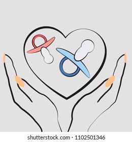 baby pacifiers in women's hands