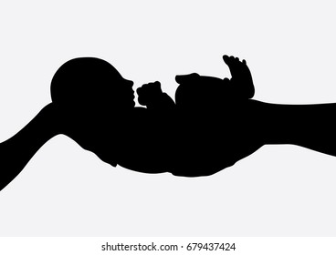 baby in parent hands 