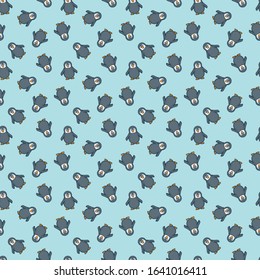 Baby penguins seamless wallpaper pattern on light turquoise background vector illustration.