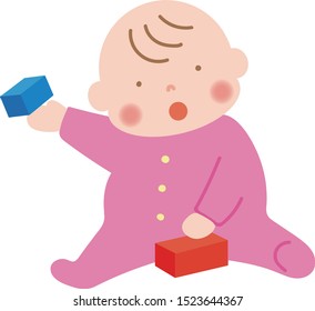 Baby is playing with building blocks