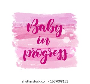 Baby in progress -  inspirational handwritten modern calligraphy lettering on watercolor painted background. Gender reveal. Pink colored - for baby girl.