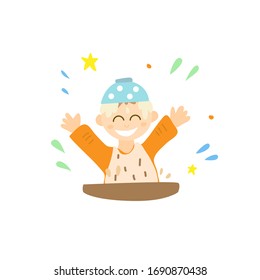 A baby puts a plate with porridge on his head. Happy childhood. Games at the table while eating.