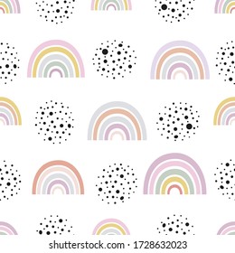 Baby rainbow with black dots seamless repeat pattern pastel colored for fabric design vector background