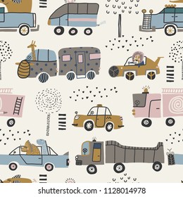 Baby seamless pattern with cute cars, lion, elephant and dinosaurs. Perfect for kids fabric, textile, nursery wallpaper. Vector Illustration. Scandinavian style.