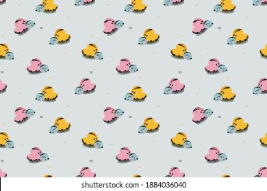 Patrón infalible de mariposas sonrientes monas y garabatos de corazones sobre un fondo gris. Para ropa de niñera, papel de envoltura, papel tapiz de vivero. Vector.
