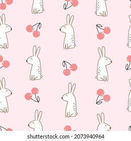 Baby seamless pattern cute rabbit with cherry on pink background hand drawn design in cartoon style Used for prints, decorative wallpaper, textiles, vector illustrations.