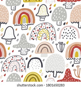 Baby seamless pattern with mushrooms, rainbows. Autumn background. Perfect for fabric, textile. Creative vector background.