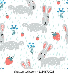 Baby seamless pattern - rabbits in strawberries and flowers. Cute childish seamless pattern in cartoon style. Vector texture in childish style great for fabric and textile, wallpapers, backgrounds.