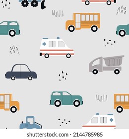 Baby seamless pattern with transport. Cartoon toy cars. Hand drawn cars in Scandinavian style. Funny vehicles. Creative kids background. Ambulance, school bus, truck, bulldozer.