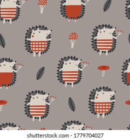 Baby seamless vector pattern. Cute hedgehogs and mushrooms on brown background. Creative scandinavian kids texture for fabric, textile, wallpaper, apparel. Vector illustration in pastel colours.