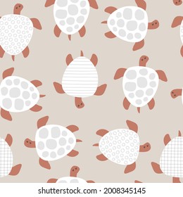 Baby seamless vector pattern. Cute turtles on beige background. Creative scandinavian kids texture for fabric, wrapping, textile, wallpaper, apparel. Vector illustration.