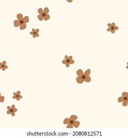 Baby seamless vector pattern. Small caramel flowers on milk background. Creative scandinavian kids texture for fabric, textile, wallpaper, apparel.  