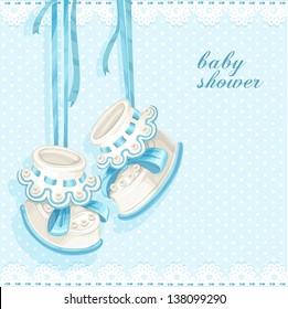 Baby shower card with blue booties and lace